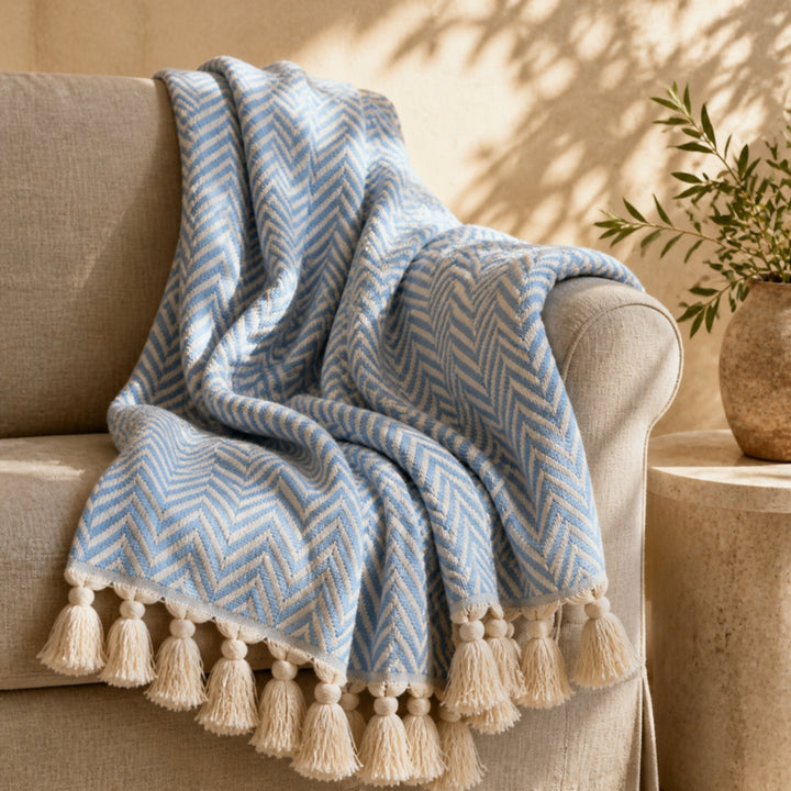 Sky Blue Turkish cotton throw draped over a linen armchair