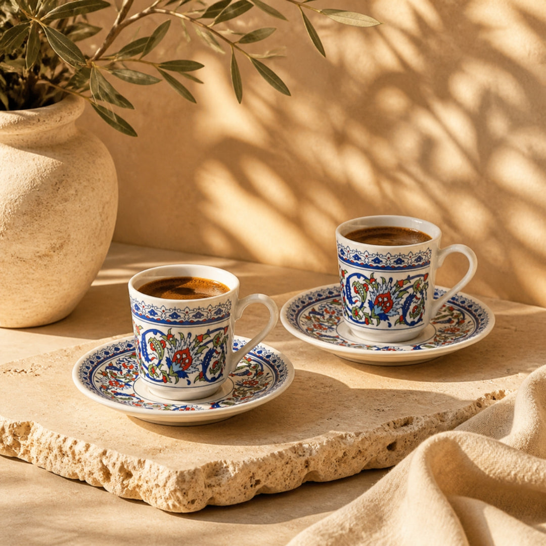 Topkapi Turkish coffee cups and saucers with Turkish coffee on travertine